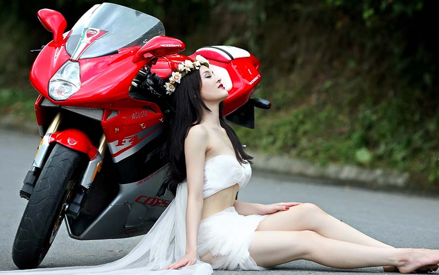 Beautiful girls and motorcycles in Rajkot